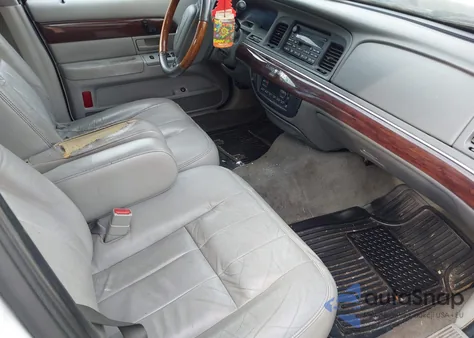 2003 Mercury Grand Marquis Ls z USA, uszkodzony, nr VIN 2MEFM75W63X694931